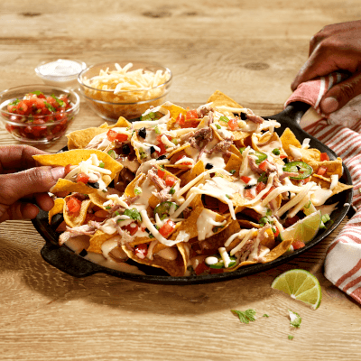 Nachos with Pulled Pork and <strong>Kingsey<sup>®</sup></strong> Shredded Pizza Mozzarella Cheese